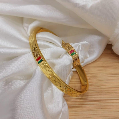 Gold Plated Gucci Stainless Steel Bangles And A Matching Ring Providing Elegant Design Everyday Fashion Support